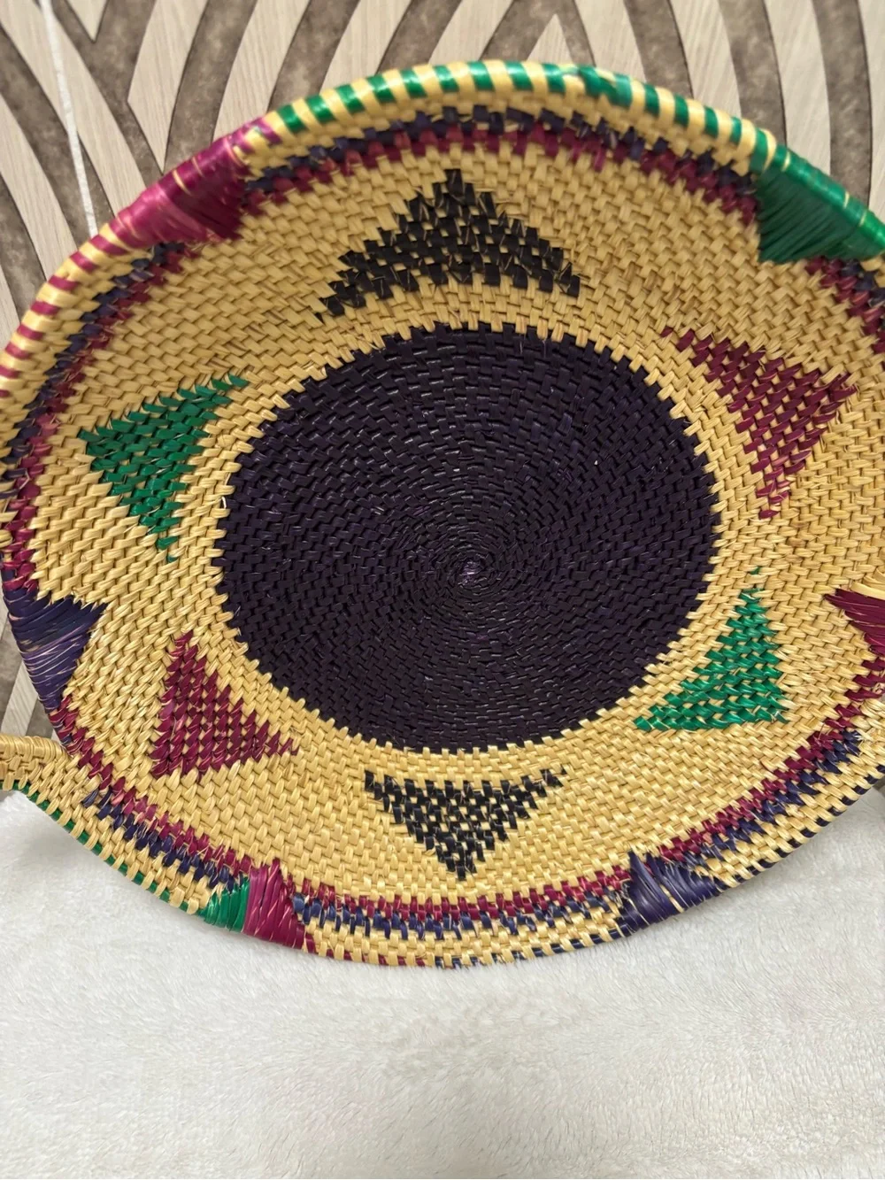 African hand woven colorful wall basket with handles
